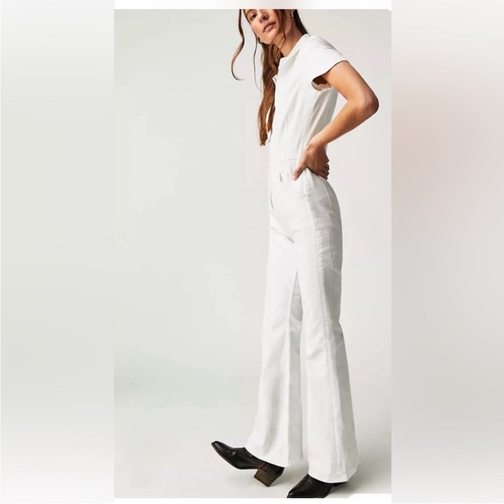 FREE PEOPLE WE THE FREE JAYDE DENIM FLARE JUMPSUIT IN PURE WHITE - Picture 2 of 3
